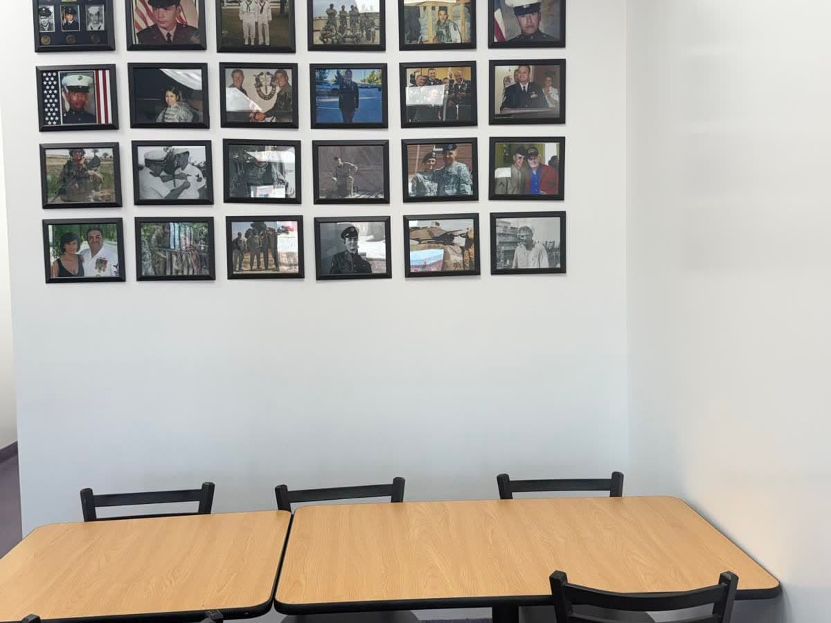 Veterans wall grid above the dine-in tables